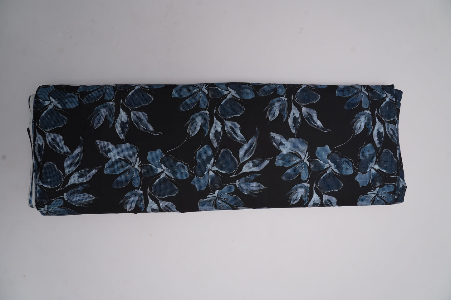 FIONA DIGITAL - Black base with denim-blue floral print.